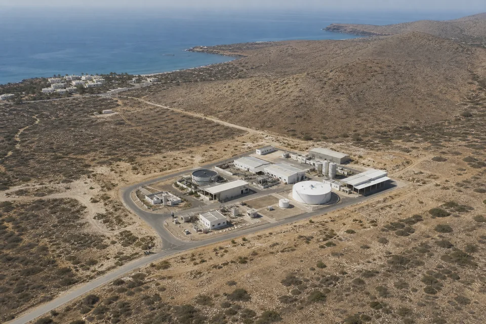 A fictional conventional coastal water facility forming one concentrated visible footprint.